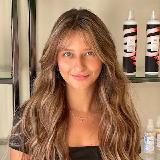 Honey balayage with soft bangs