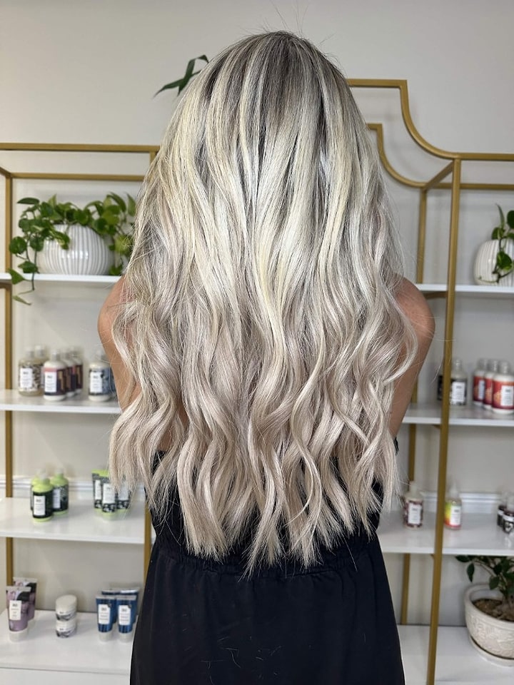 Cool ash blonde waves from behind