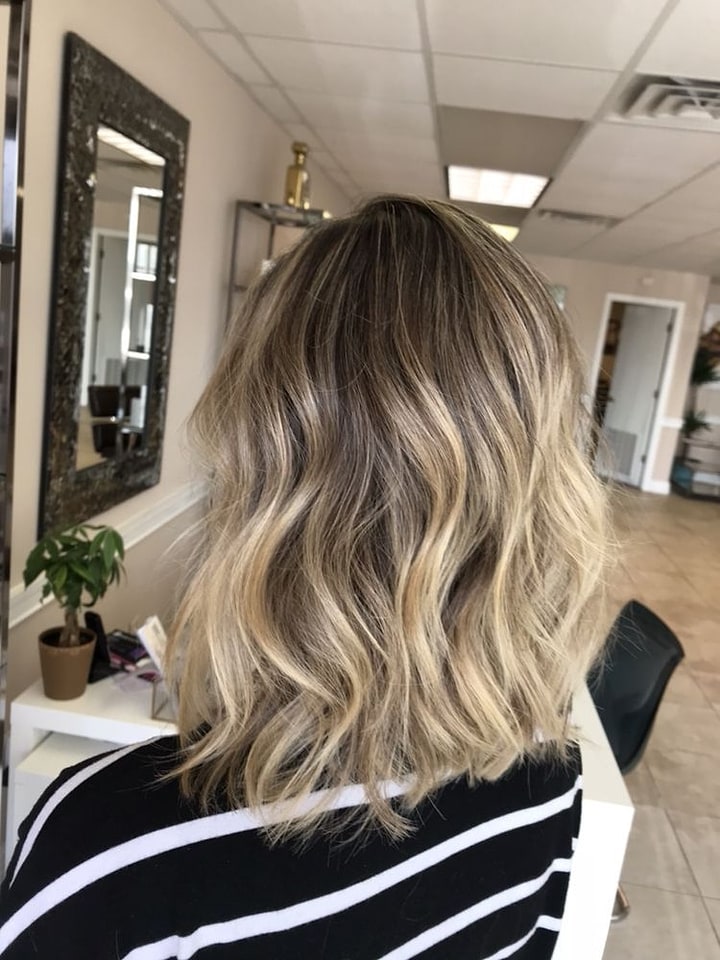 Ash blonde lob with beach waves